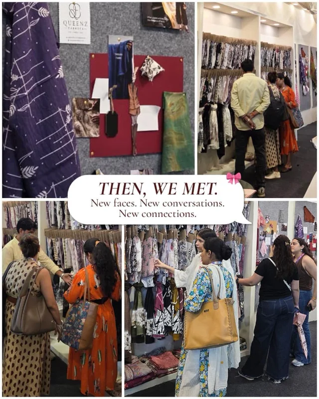 Buyers browsing printed fabric swatches at the Queenz Fabrica stall
